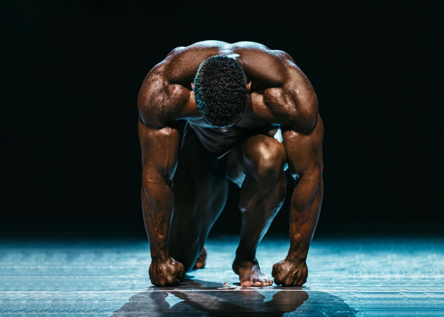 Athlete in a powerful coiled training position